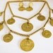 1960s necklace. goldette gold lion coin medallion set. EGYPTIAN GODDESS.