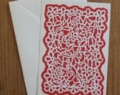 Small: Floral lace pattern with red background