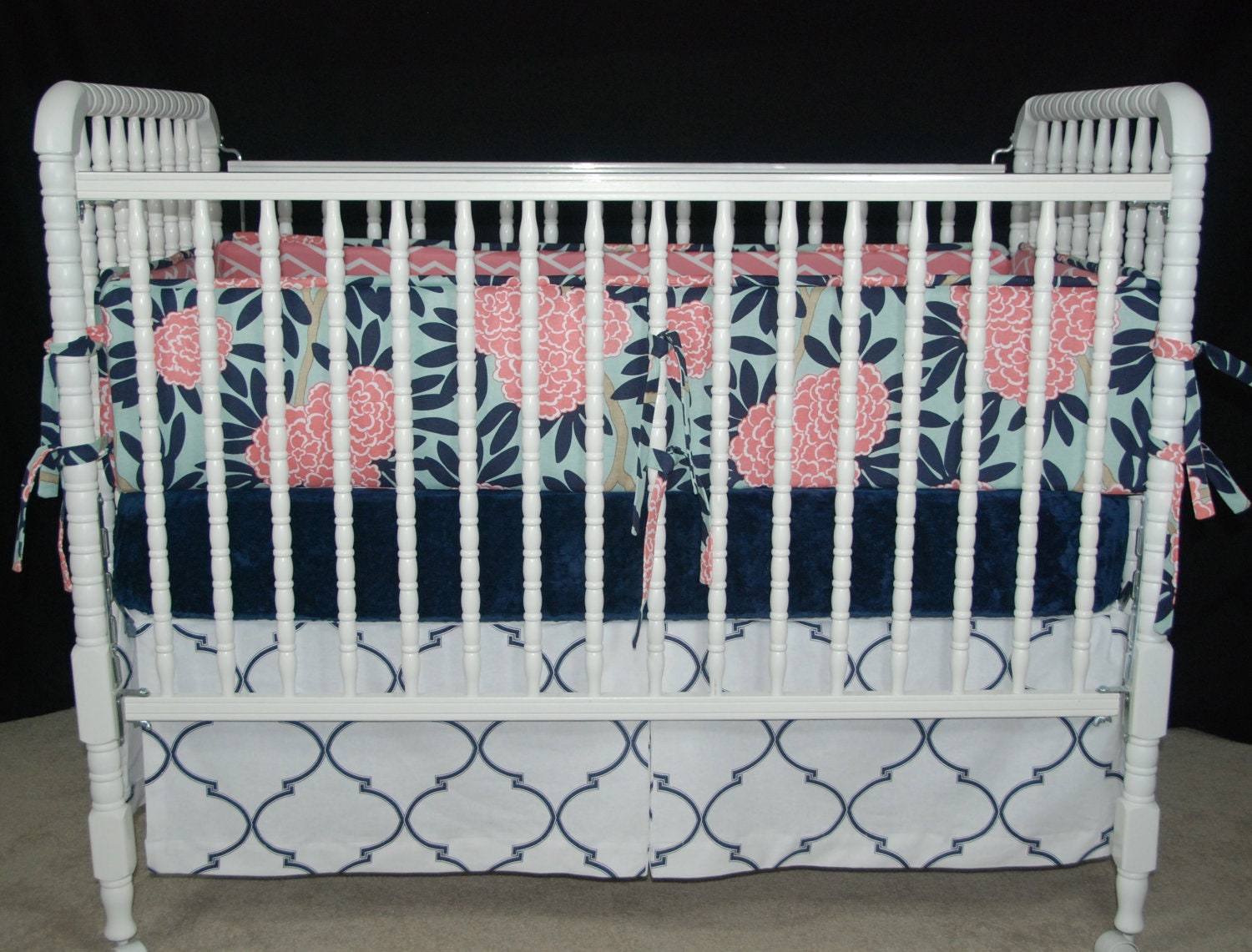 Custom Crib bedding: Skirt and Bumper In Caitlyn Wilson fabric . Navy, PInk, Aqua and Beige