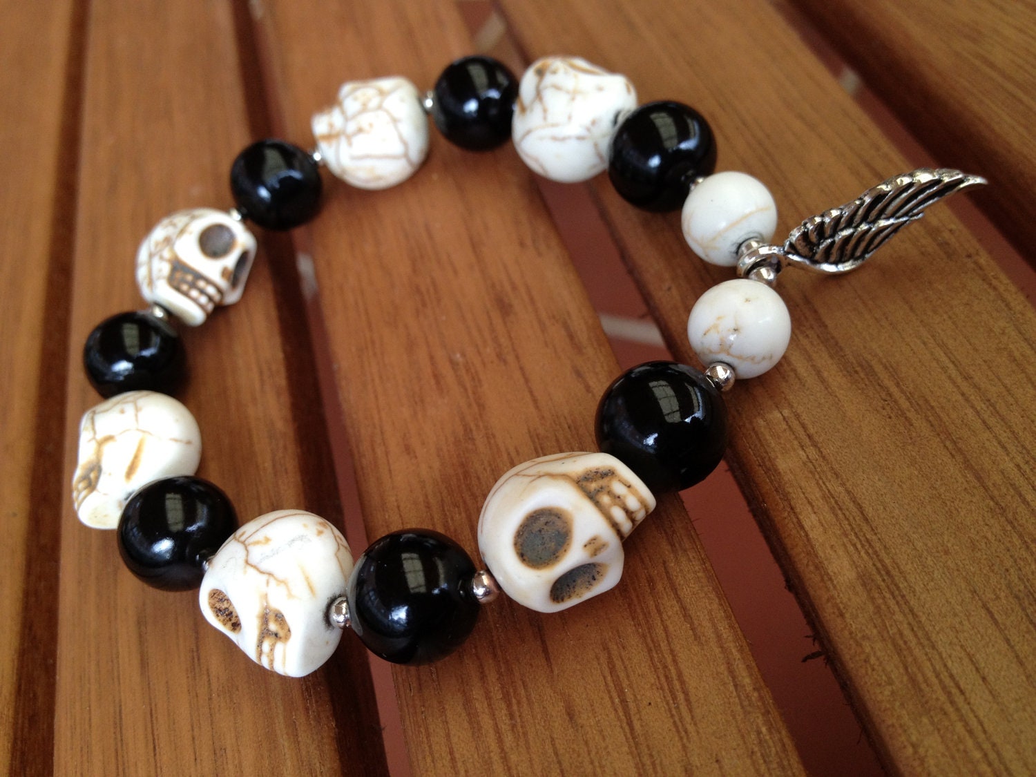 Skull Bracelet with Wing Charm
