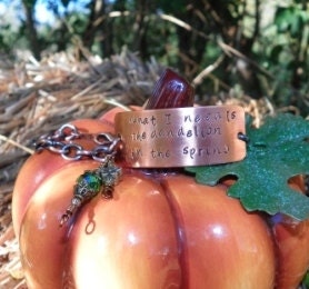 The Hunger Games Stamped Bracelet - "What I Need"