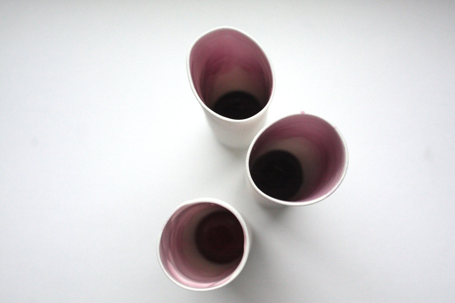 Decorative thin tall tube made out of stoneware English fine bone china and resin