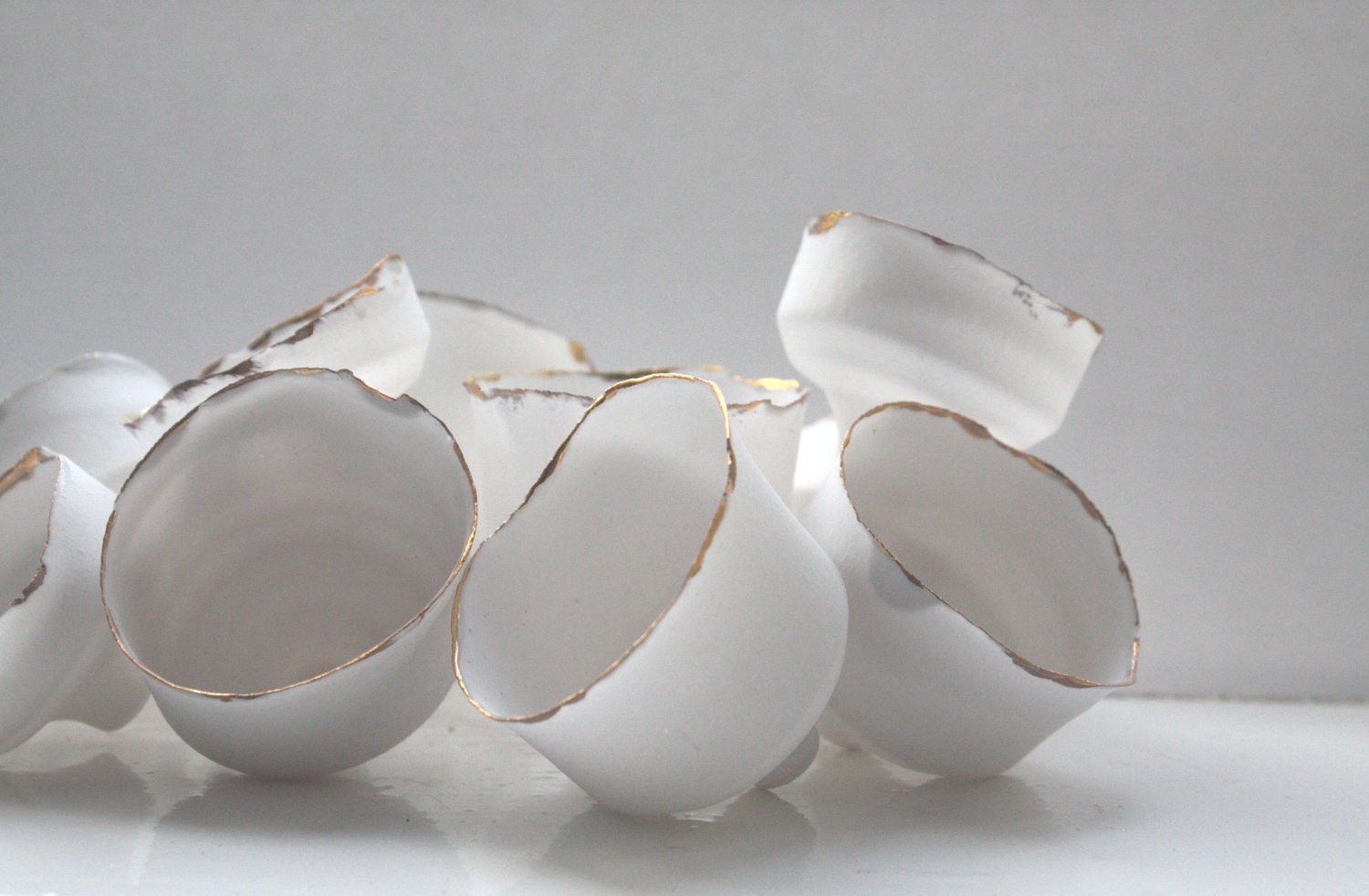 Japanese inspired small ornamental cup handmade from English fine bone china with a real gold rim