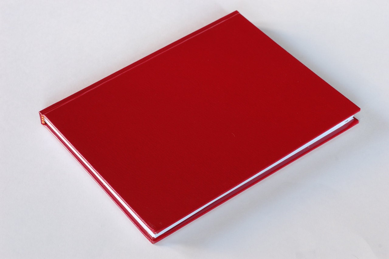 The Gnotebook, a unique iPad case handmade from an engineering notebook, with internal magnets (red leather cover / black interior)
