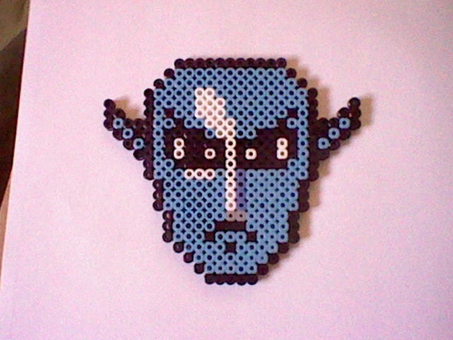 The Legend of Zelda Zora Mask perler bead creation....melted beads with magnet on back