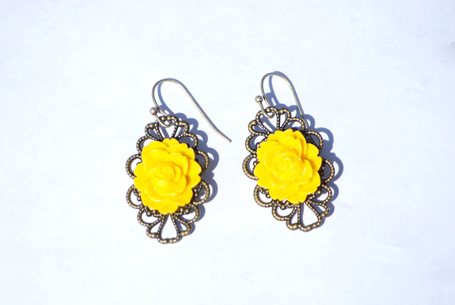 Antiqued Bronze Earrings with yellow resin flower
