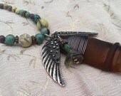 A Hard Days Night: Bottle Neck Wire Wrapped Genuine Sea Glass Charm Yellow Turquoise Necklace