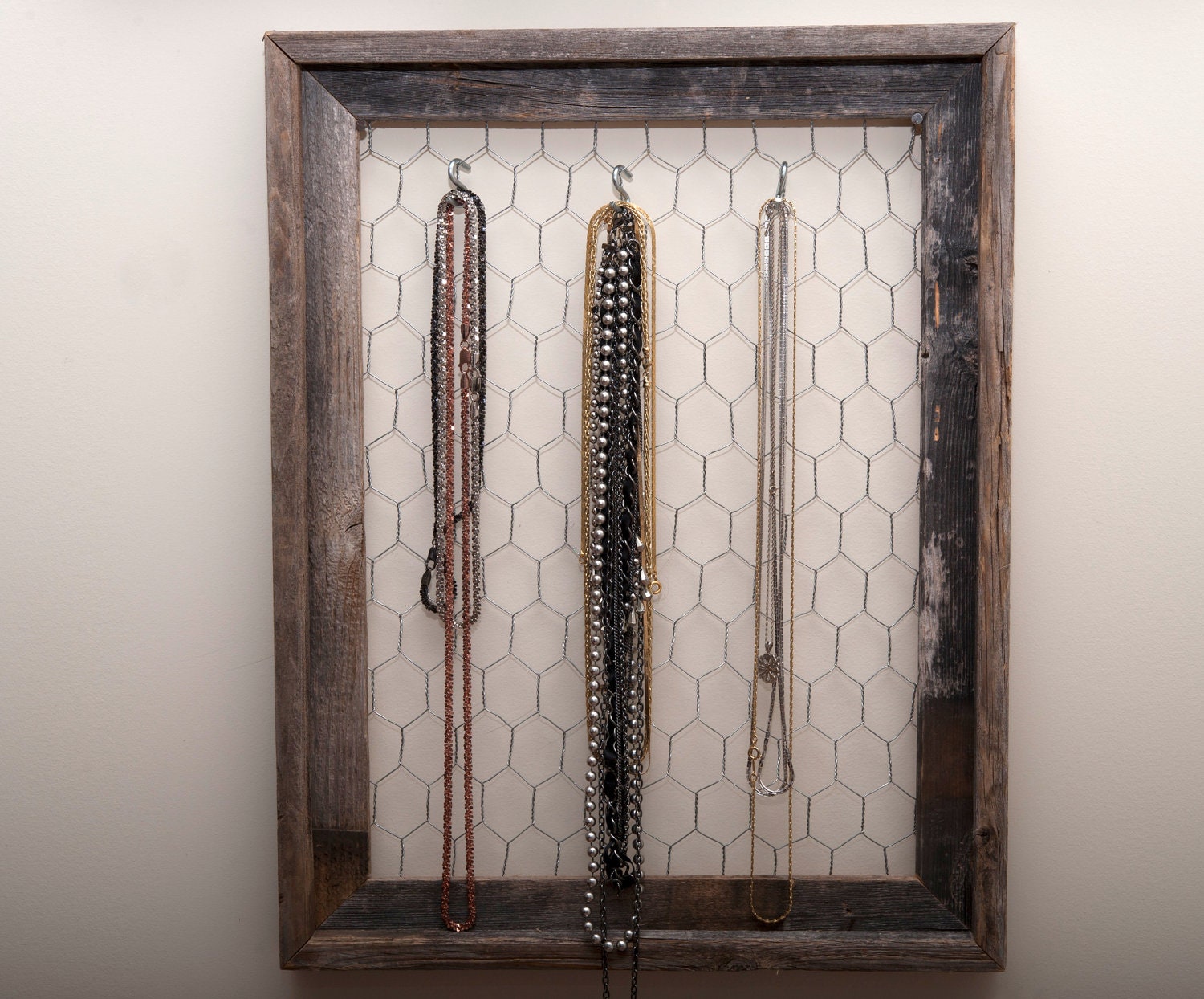 Hanging Jewelry Organizer made with reclaimed barn wood
