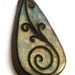 Teardrop necklace in shades of blue and gold with spiral design