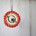 Raspberry and Ochre Crocheted Necklace with Bronze Flower