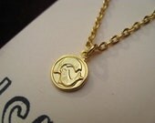 PISCES // tiny zodiac charm necklace.