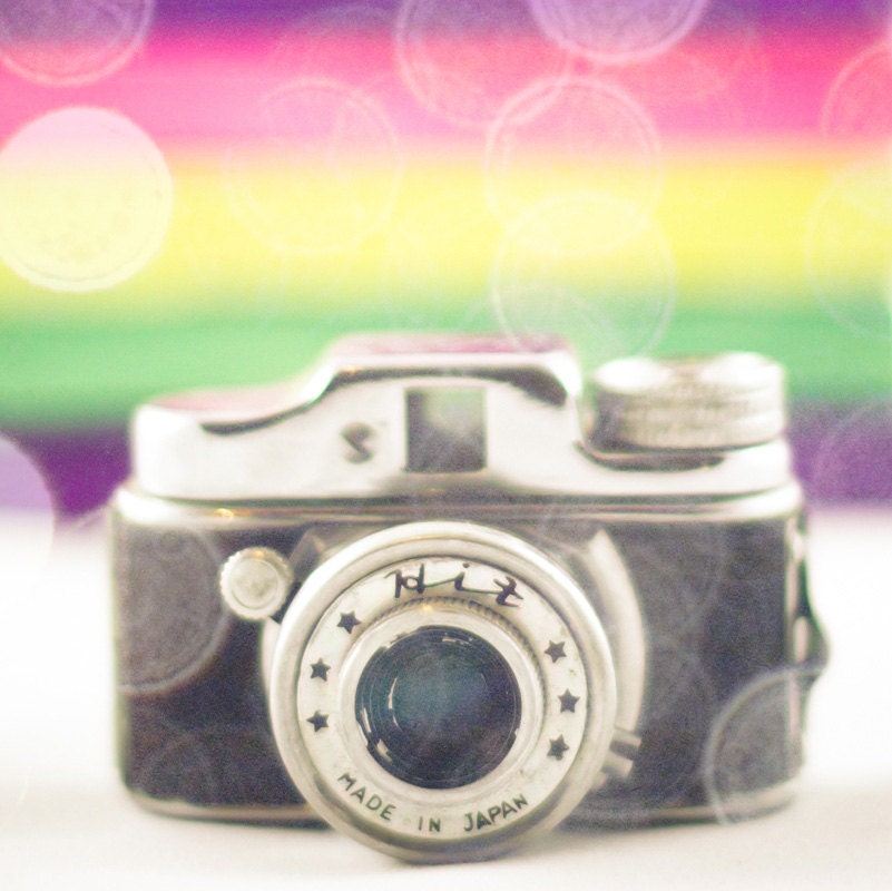 Rainbow Bokeh Hit, Colorful Mini Vintage Camera, Hipster, Yellow, Green, Purple - 12x12 - Signed Fine Art Photograph by Kimberly Kling
