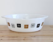 Atomic Snowflake Baking Dish in Black and Gold - Round Milk Glass Casserole with Holiday Starburst Pattern by Inland Glass