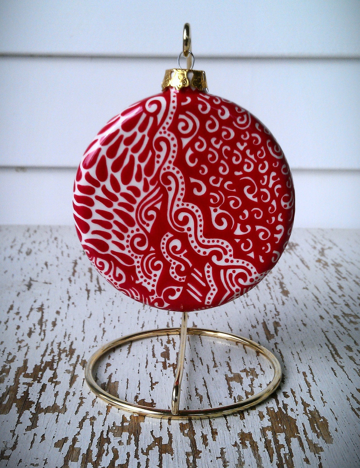 Red and white, Dimensional circle ornament, hand painted, abstract, comes with fancy ornament hook- shown in last picture, holiday ornament