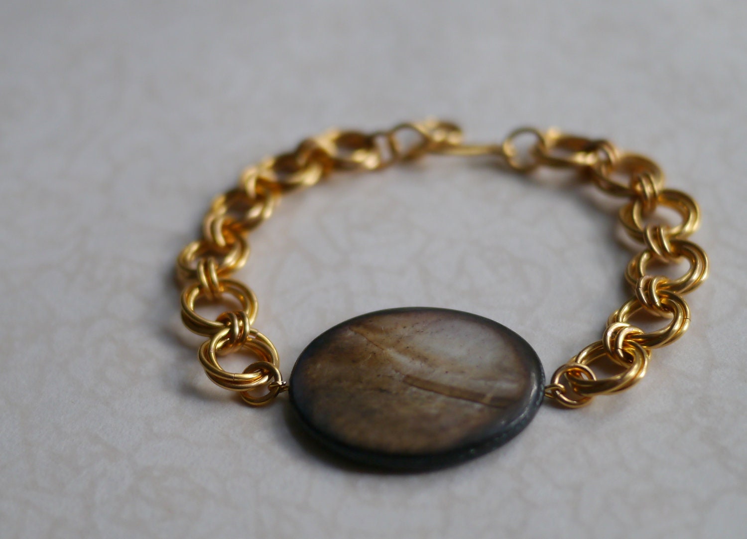 Delicate Gold Braclet with Large Pearly Cream and Brown Bead -- Mobius Chainmaille Bracelet