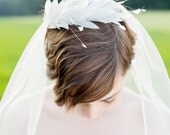 Hair accessory, fascinator,  chaplet  for the bride with cocks feathers.