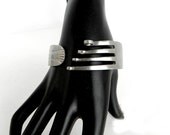 Fork bracelet. Big bended round nose stainless steel fork.