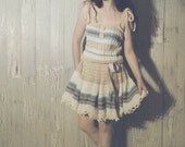 Handknitted Dress in cream aqua pink and white
