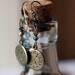 Steampunk clock earrings with golden beads