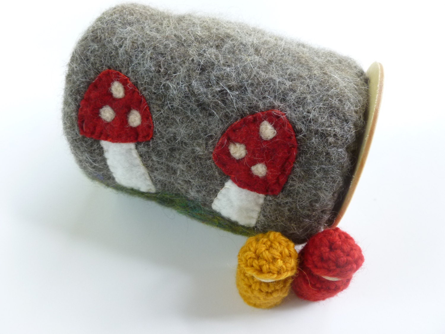 Felted wool log with wood peg dolls