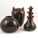 Handmade Ceramic Sculpture vase / Art Vessel in chocolate cherry glaze