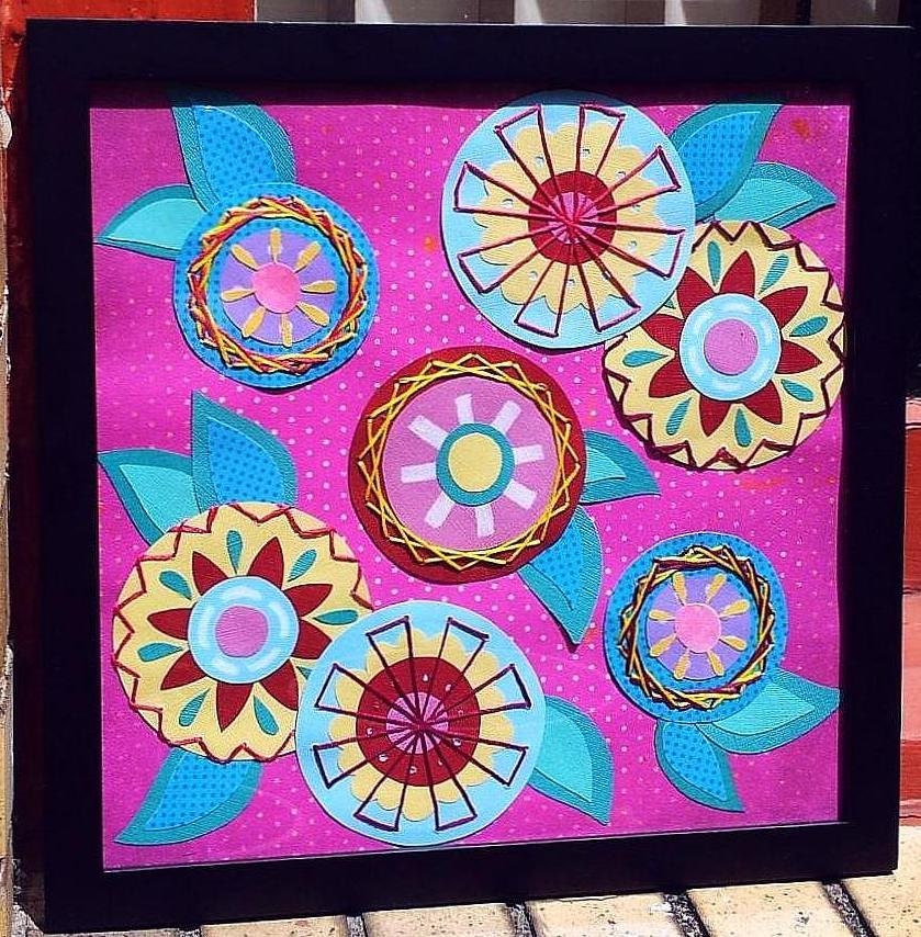 vibrant retro feel hand sewn framed paper flowers