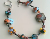 Lampwork color bracelet with black and brights CGGE