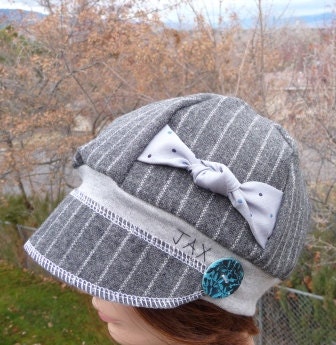 Jax Hats made from upcycled skirt with a side bow refashioned from a men's tie - first 3 hats in the photo