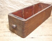 Nice vintage wooden sewing drawer to help you get organized in style