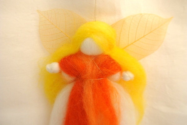 Wool blessing fairy art doll Waldorf education in orange