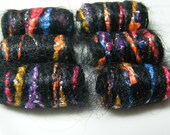 Fiber Bead To remove the drab effect of black, color should be added-- blue, cerise or lilac. Only then will we feel suitably presented.