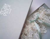 Forever lace garter with rhinestone trim