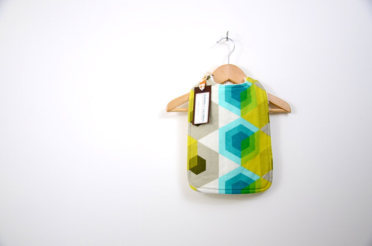 baby bib, multi-tonal hexagon pattern, super bright, modern, and parent-friendly.