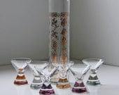 tall decanter with 6 shot glasses