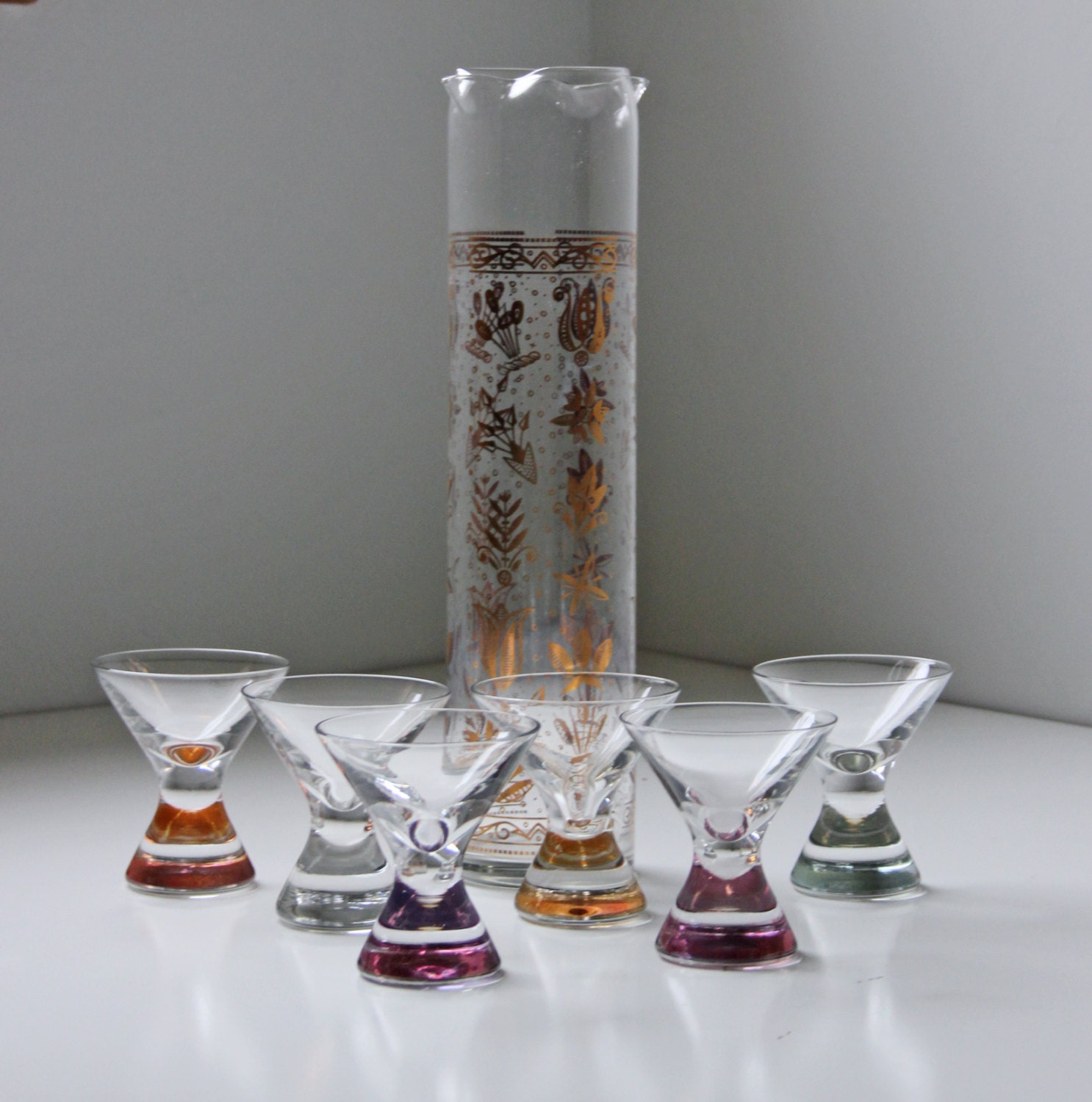 tall decanter with 6 shot glasses