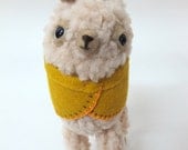 Small Wooly Alpaca in a Mustard Embroidered Cape