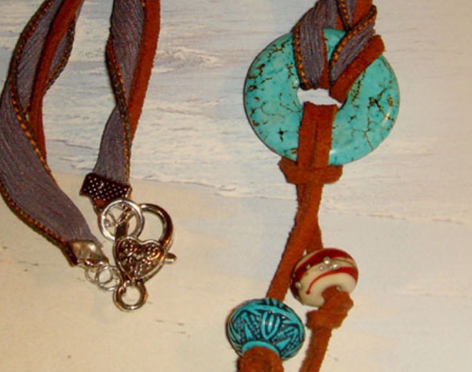 Turquoise Circle Stone Pendant on a beautiful grey silk ribbon and brown suede necklace