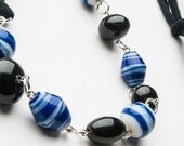 chunky necklace with big blue and white and black beads with jersey tie