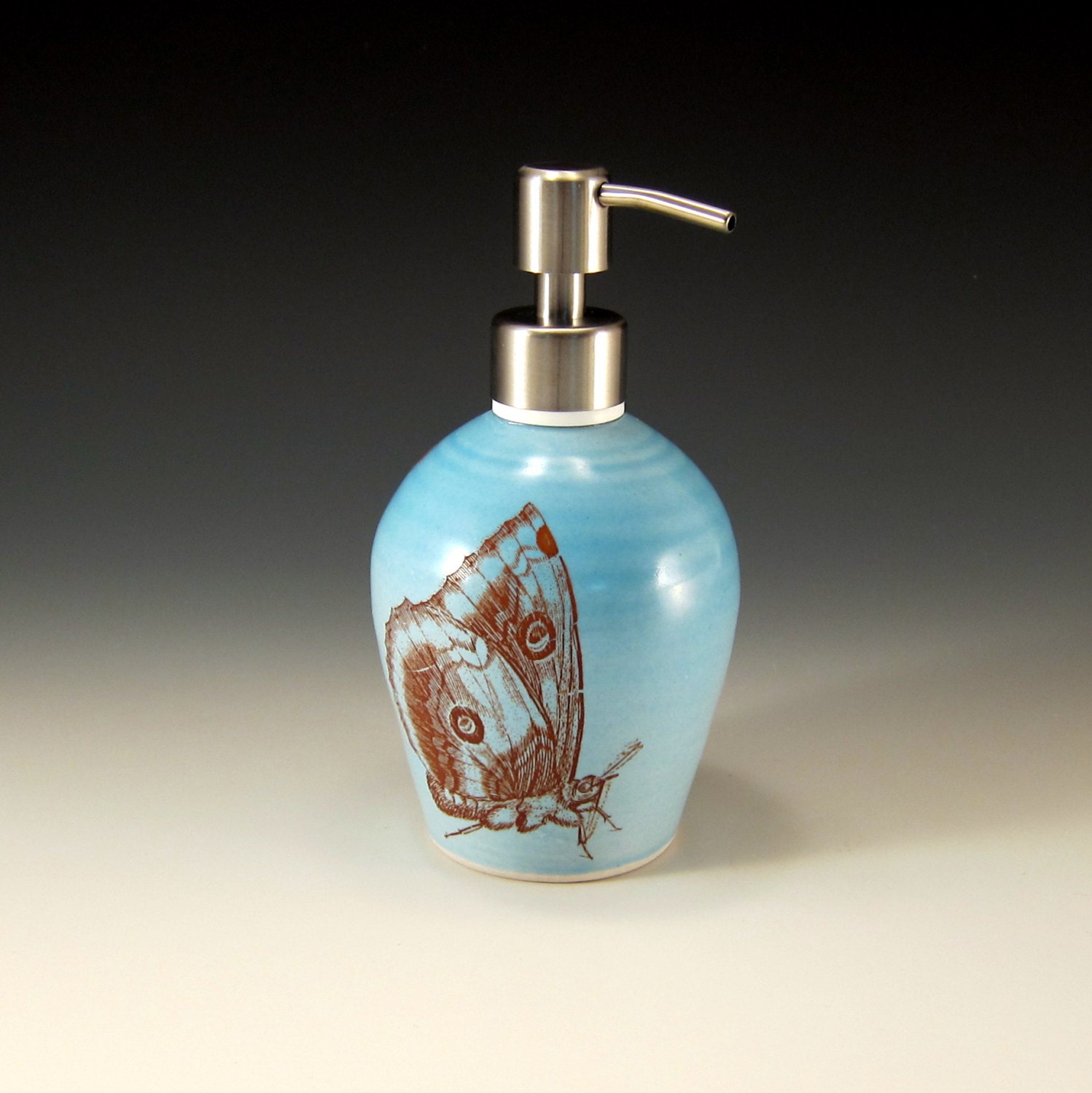 Porcelain soap dispenser - brushed nickel pump - blue glaze with butterflies