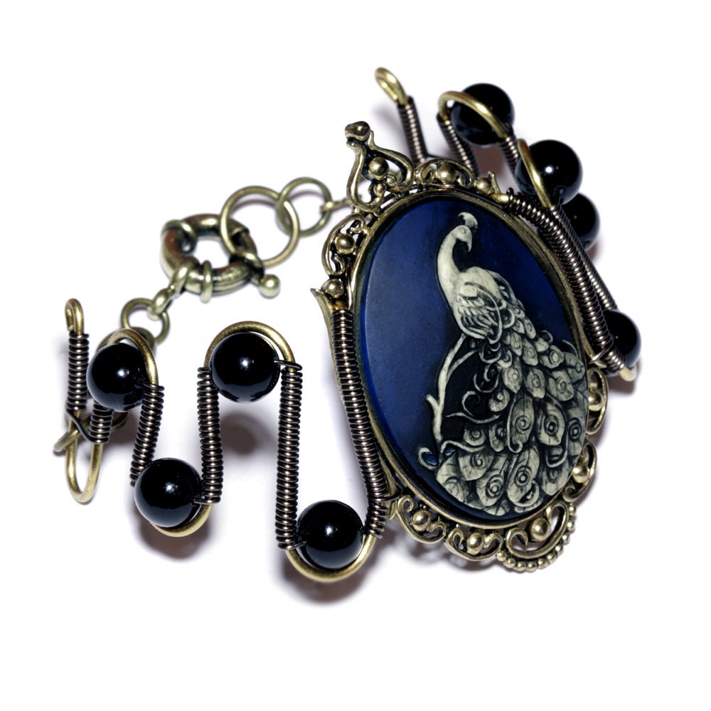 SteamGoth Jewelry - Bracelet - Ivory Peacock on Dark Blue Background Cameo