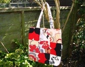 Patchwork tote in reds, blacks & browns