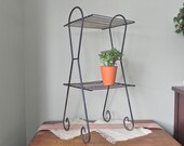 Vintage mid century modern black plant stand tablemetal two shelves - swirly legs