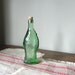Vintage green glass fish bottle with cork stoppermid century modern collectible bottle collection