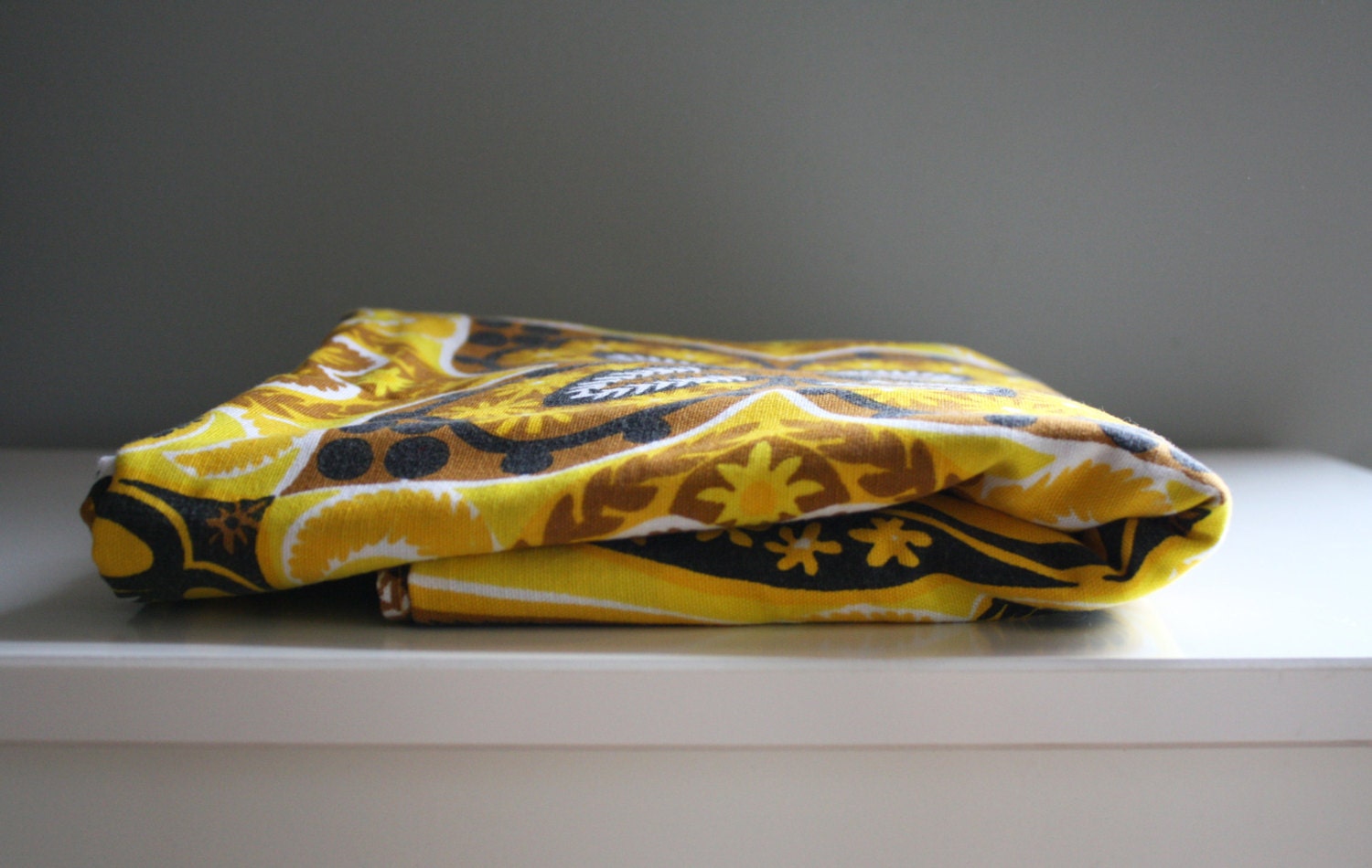 vintage. vera. bright yellow orange and black paisley floral tablecloth. table cloth. linen. 1960s.