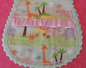 Baby Burp Cloth in Animal print witha pink polka dot ruffle and a hand crocheted edge is perfect for the little girl in your life