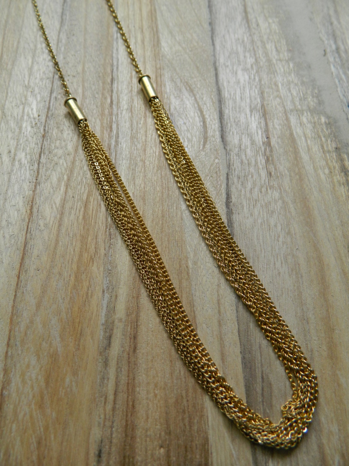 Sustainable double bullet casing necklace (mini gold)