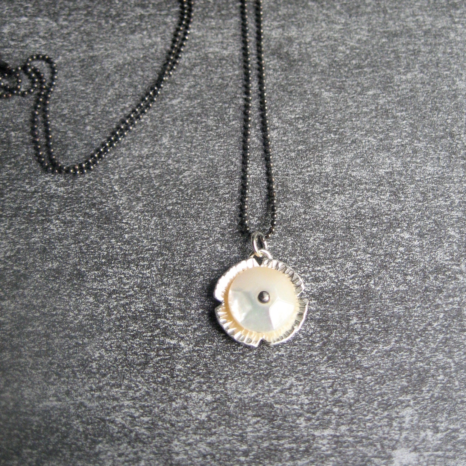 PENDANT sterling mini floret and old button