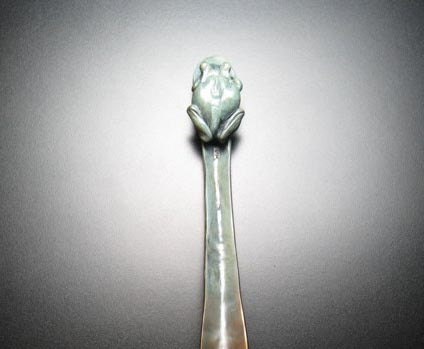 Tree frog shoe horn. Bronze sculpture, edition of 25