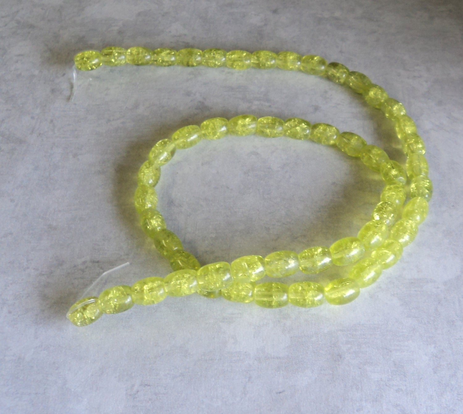 DESTASH SALE Beads Crackle Glass 7x6mm Oval  15 Inch Strand Lime Green