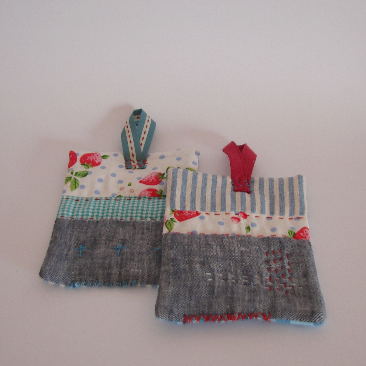 Set of 2 Zakka style pot holders blues and strawberries